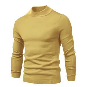Detailed view of men's mustard yellow mock neck slim fit knit sweater texture and fabric.
