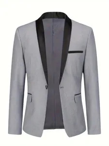 Close-up details of men's gray suit jacket featuring elegant black shawl lapels and pocket trim.