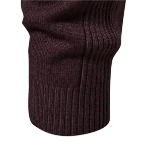Men's knitted sweater long sleeve detail view in dark red, thick warm slim winter top.