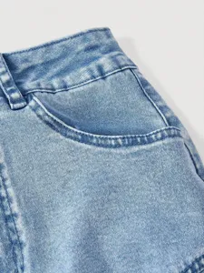 Close up detail of women light blue stretch denim skirt pocket waistband stylish design