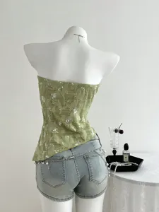Green sequin floral texture strapless tube top detail, elegant summer fashion garment style.