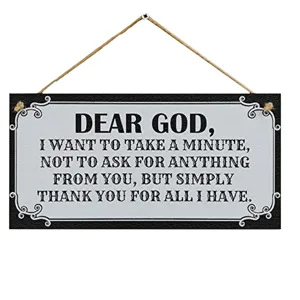Wooden hanging plaque detail featuring inspirational quote text and rustic rope for wall decor.