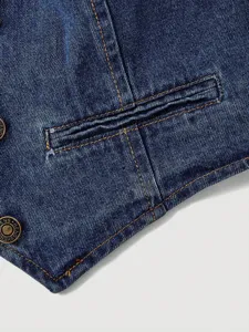 Women denim apparel detail shot featuring dark blue wash, contrast orange stitching and buttons.
