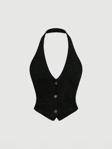 Close-up details of the black denim halter vest showing front metallic buttons and V-neck.