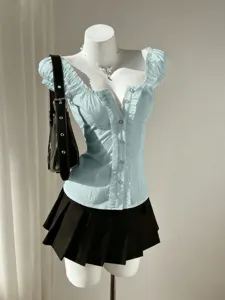 Light blue ruffled short sleeve blouse with black pleated skirt, sweet style outfit set.