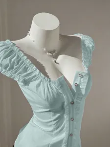 Light blue sweet style puff sleeve short sleeve blouse for women with delicate button front.