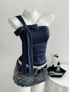 Women one-shoulder polka dot camisole sweet style bow strap crop top with denim skirt set.
