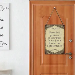 Rustic wooden motivational hanging sign detail with inspirational quote for home decor.