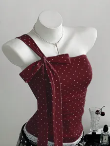Stylish red polka dot one-shoulder bow top with slim fit and elegant design for women.