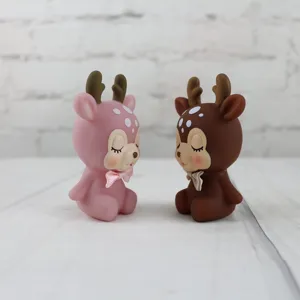 Cute cartoon deer figurines detail, resin animal cake topper and room decor ornament.