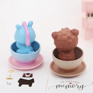 Creative cute animal figurine in miniature teacup detail shot for car decor and desk ornament