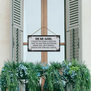 Rustic wooden hanging plaque wall sign detail with inspirational quote lettering decor.