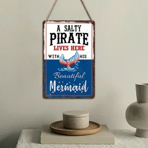 Nautical style wooden hanging sign detail, pirate and mermaid theme wall plaque decor.