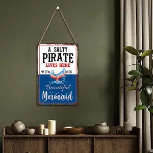Detail view of vintage wooden hanging sign with ocean pirate theme, perfect interior decor.