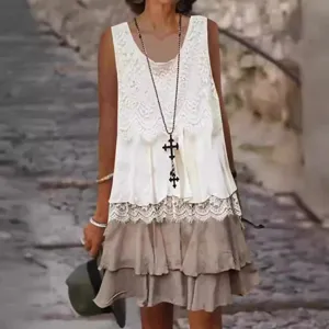 Detail view of women sleeveless lace patchwork dress, stylish casual ruffle skirt design.