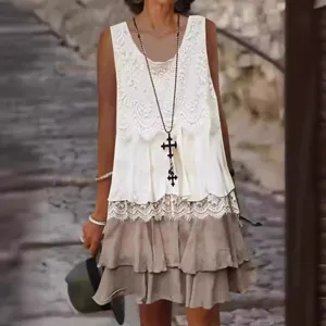 Women casual sleeveless lace spliced dress with tiered khaki skirt and cross necklace pairing.