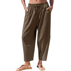 Vue detaillee de pantalon decontracte femme avec cordon de serrage marron, coupe ample.