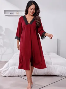 Plus size women's long sleeve V-neck nightgown with elegant black lace trim in burgundy red.
