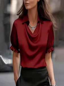 Elegant women's cowl neck short sleeve blouse with collar and ruffled cuffs for summer.