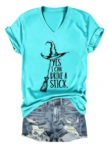 Turquoise V-neck short sleeve T-shirt featuring a fun witch hat and broom graphic print.