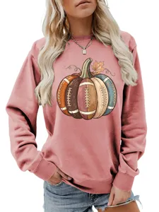 Detailed view of the cute autumn football pumpkin graphic printed on the soft pink crewneck top.