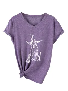 Detail of women purple V-neck short sleeve t-shirt with cute witch hat print graphic front.