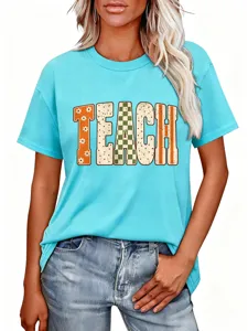 Close-up detail of the women's light blue short sleeve t-shirt with retro TEACH print.