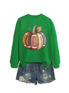 Detail view of womens autumn winter green sweatshirt featuring funny football pumpkin print set.