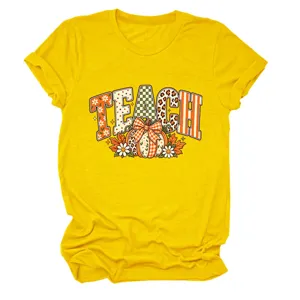 Dames casual gele korte mouw t-shirt met leuke leraar pompoen grafische print.