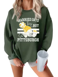 Casual green long sleeve sweatshirt featuring skeleton graphic and Pittsburgh text for women.