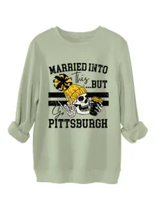 Sage green long sleeve crewneck sweatshirt with humorous skull print for casual wear.