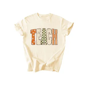 Casual women's short sleeve T-shirt featuring retro TEACH graphic print for daily summer wear.