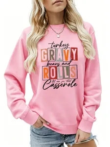 Sweatshirt rose à manches longues et col rond pour femme avec imprimé amusant.