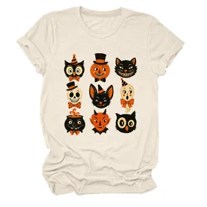 Close-up detail of vintage Halloween graphic print on beige short sleeve t-shirt fabric.