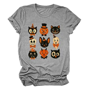 Close-up detail of vintage Halloween graphic print on grey short sleeve t-shirt, retro style.