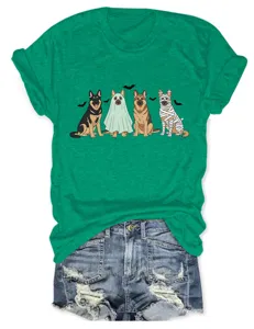 Detailed close-up view of the green t-shirt with cute German Shepherd Halloween graphic.