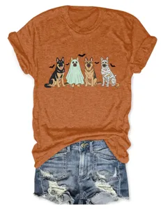 Detailed shot of orange Halloween dog graphic short sleeve tee shirt with denim shorts.