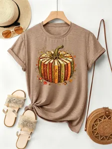 Lässiges Damen Kurzarm T-Shirt mit herbstlichem Kürbis Buch Grafikdruck Detail.