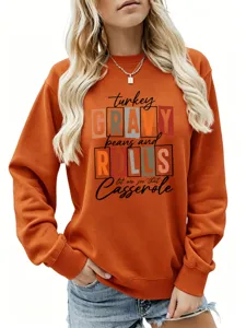 Gros plan sur l'imprimé graphique de dinde de Thanksgiving sur le sweat-shirt d'automne élégant.