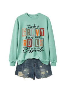Sweat-shirt vert menthe col rond à motif Thanksgiving associé à un short en denim.