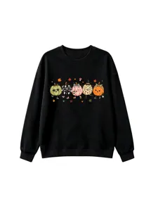 Close-up detail of the cute autumn pumpkin graphic print on the black long sleeve sweatshirt.