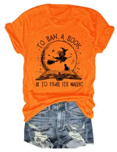 Halloween witch book graphic print orange short sleeve t-shirt with blue denim shorts outfit.