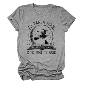 Women's grey short sleeve T-shirt featuring a witch and book graphic print, casual tee.