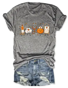 Detailed view of the cute medical cartoon graphic printed on a comfortable grey short sleeve t-shirt.