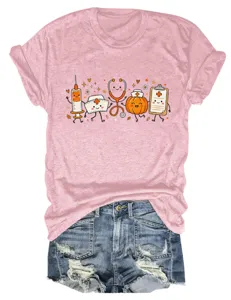 Close-up detail of the cute medical cartoon print pink short sleeve t-shirt and denim shorts.
