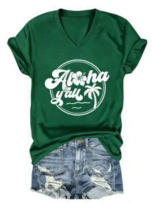 Detailed view of dark green V-neck short-sleeve t-shirt with white tropical Aloha graphic print.