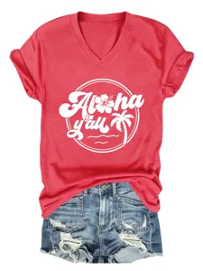 Close-up detail of the red V-neck T-shirt featuring a white Aloha y'all graphic and cuffed sleeves.