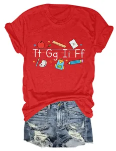 Red short-sleeve T-shirt with alphabet and school stationery print paired with denim shorts.