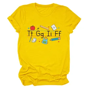 Close-up of yellow women short sleeve t-shirt with alphabet and school stationery print design