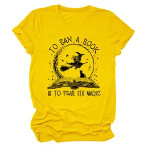 Yellow women short sleeve graphic t-shirt featuring witch and book print for daily use.
